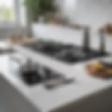 Cleaning tools beside a white glass cooktop