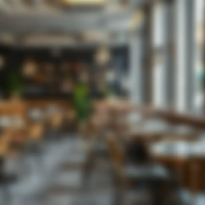 Elegant metal chairs paired with modern glass tables in a cozy indoor cafe