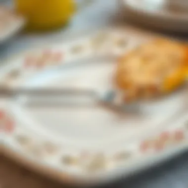 Close-up of decorative details on a square breakfast plate