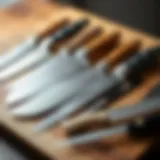 Diverse Selection of Kitchen Knives Variety of kitchen knives laid out elegantly on a wooden board